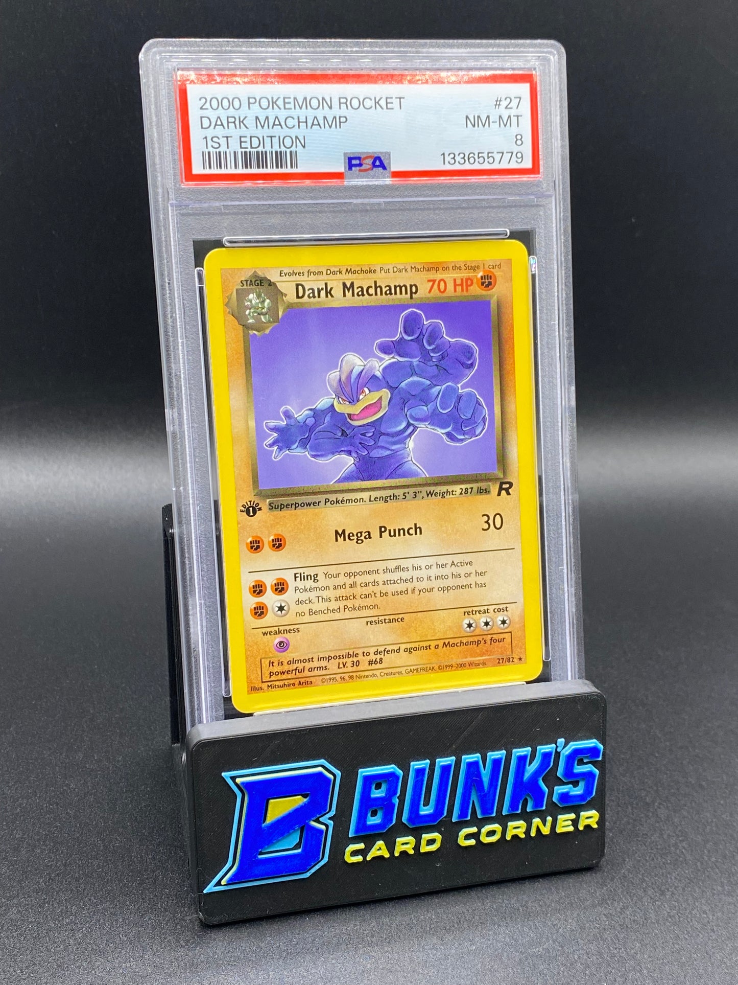 Dark Machamp 1st Edition Rocket PSA 8