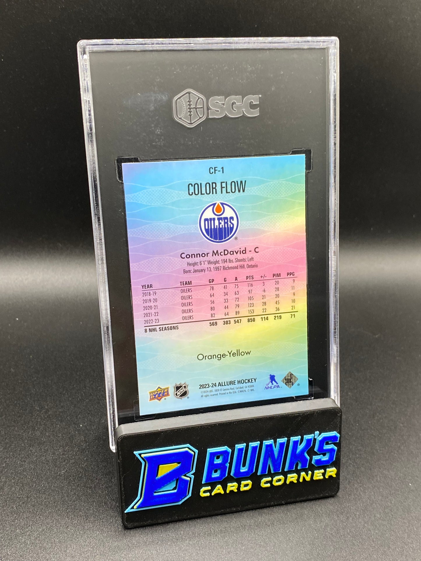 2023-24 Connor McDavid Color Flow Orange/Yellow SGC 9.5