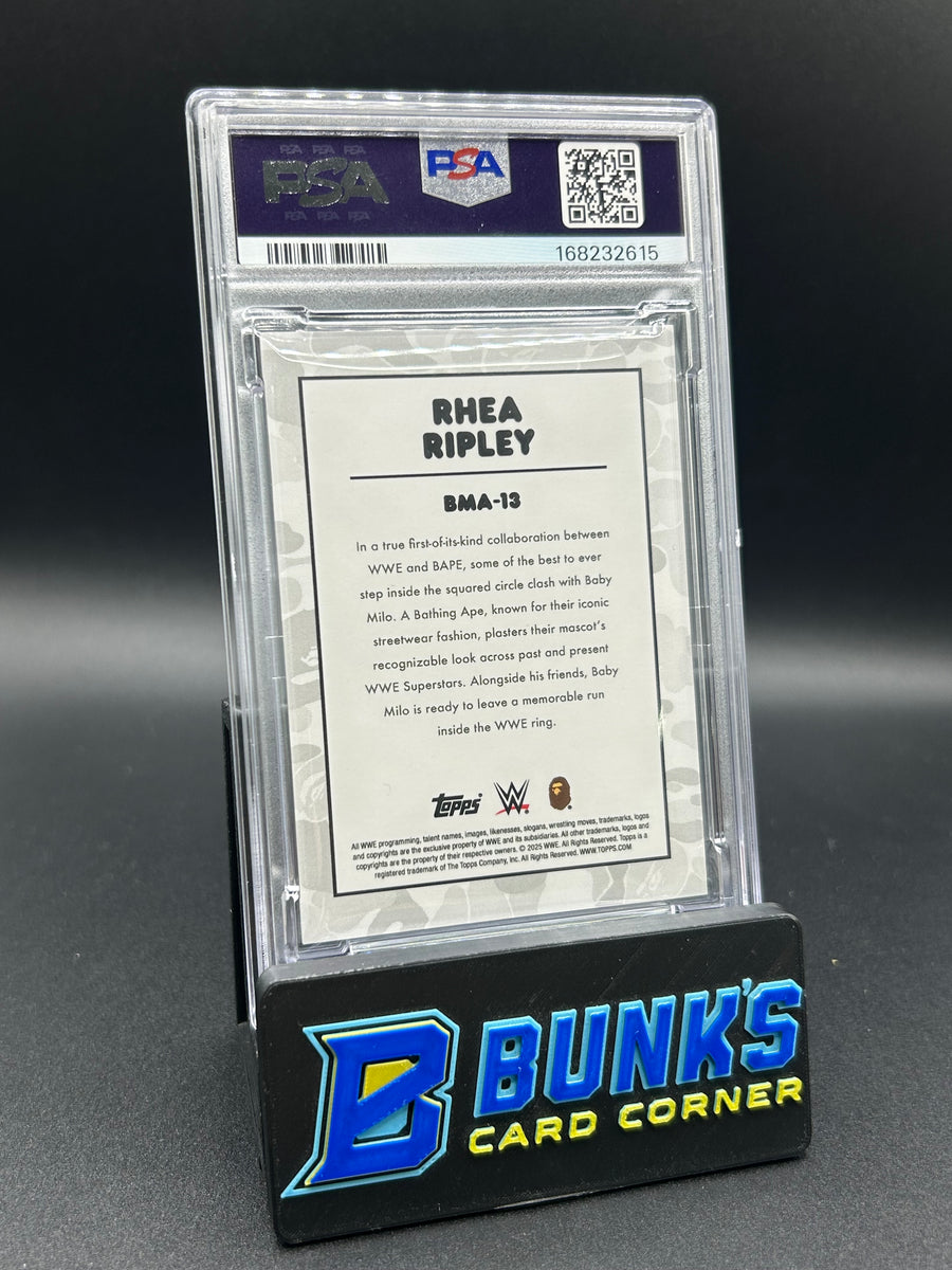 2025 Rhea Ripley Topps WWE X BAPE Baby Milo Avtr-B&W Camo FL 17/50 PSA 10