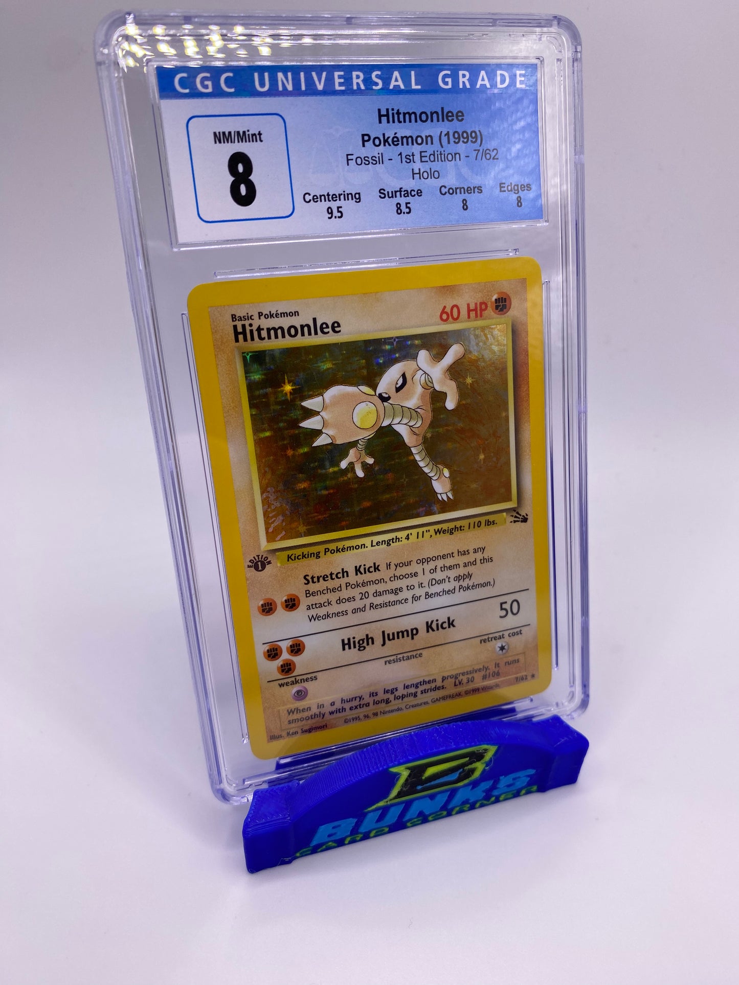 CGC 8 Hitmonlee Fossil 1st Edition
