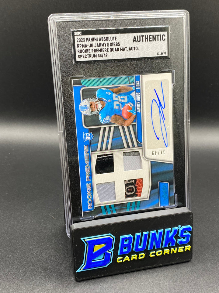 2023 Jahmyr Gibbs Rookie Premiere Quad Mat. Auto. 34/49 SGC Authentic