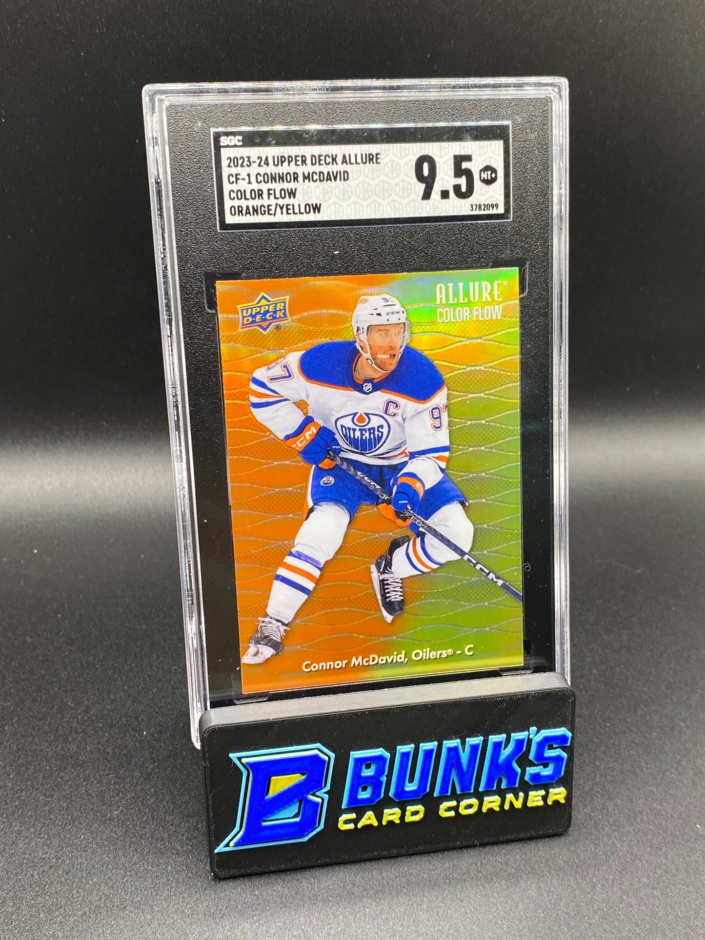 2023-24 Connor McDavid Color Flow Orange/Yellow SGC 9.5