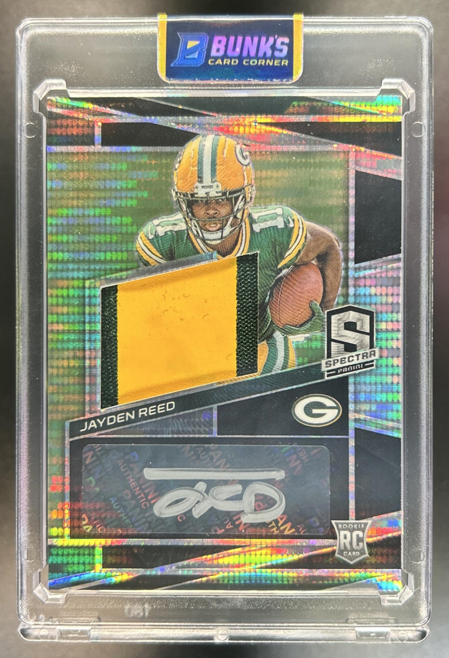 Jayden Reed 2023 Panini Spectra #218 Rookie Patch Auto Neon Black Light MEM RC 5/10 Packers