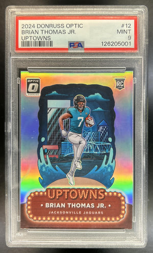 Brian Thomas Jr. 2024 Panini Donruss Optic #12 Uptown RC SSP Jaguars PSA 9